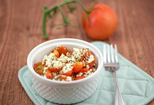 Baked Cherry Tomatoes and Feta | A simple and delicious Greek tomato recipe that has the perfect balance of acidity and salteness