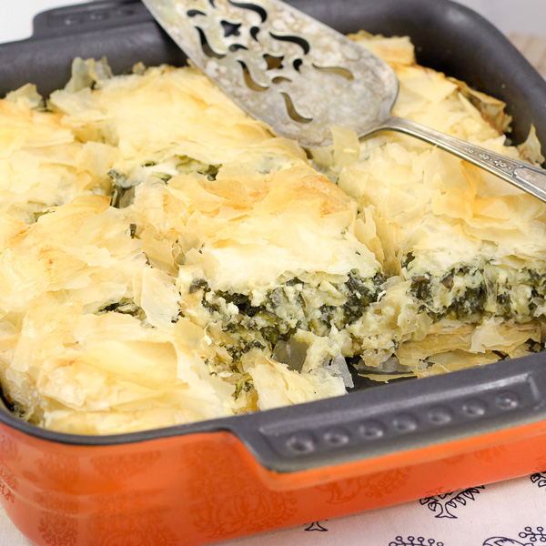 greek Spinach and cheese pie recipe. Spanakopita is easy to make the the perfect traditional Greek appetizer to serve.