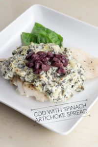 Cod with spinach artichoke spread | the perfect cod recipe with a mediterranean diet flare.