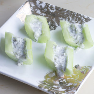 Stuffed cucumbers with feta and greek yogurt. A quick and easy healthy snack the whole family will enjoy.